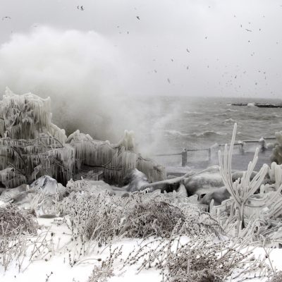 Waves off Lake Erie crash ashore east of downtown Cleveland Monday, Dec. 13, 2010. A winter storm that could last until mid-week pummeled northern Ohio on Monday with snow and gusting winds that made temperatures feel like zero. (AP Photo/Mark Duncan)