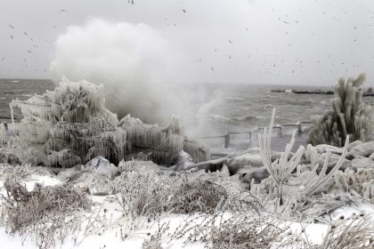 Waves off Lake Erie crash ashore east of downtown Cleveland Monday, Dec. 13, 2010. A winter storm that could last until mid-week pummeled northern Ohio on Monday with snow and gusting winds that made temperatures feel like zero. (AP Photo/Mark Duncan)