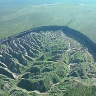 A view of the Batagaika crater, as permafrost thaws causing a megaslump in the eroding landscape, in Russia's Sakha Republic in this still image from video taken July 11 or 12, 2023. Reuters TV via REUTERS