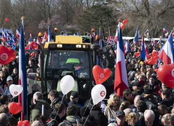 Thousands of demonstrators attend an anti-government protest by farmers' organizations in The Hague, Netherlands, Saturday, March 11, 2023. The protest comes days before Dutch provincial elections on March 15, in which a party representing farmers' interests is expected to perform well. (AP Photo/Peter Dejong)