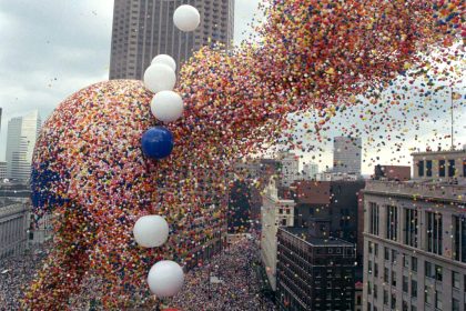 Over 1.5 million balloons rise from Public Square in Cleveland, Ohio, obscuring the Standard Oil Headquarters building, Sept. 27, 1986. Promoters of the event, the kickoff for the city's United Way campaign, claim the million and a half helium filled balloons was a world record for a single ascent. (AP Photo/Mark Duncan)