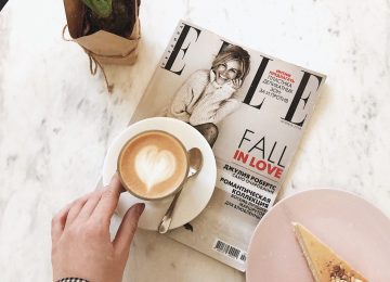 Flatlay with coffee and Elle magazine