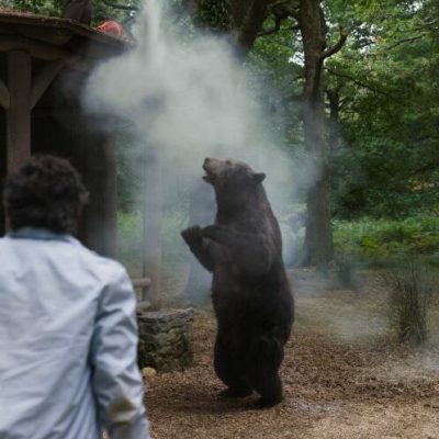 (from left, back to camera) Eddie (Alden Ehrenreich) and Stache (Aaron Holliday) in Cocaine Bear, directed by Elizabeth Banks.