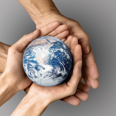 people-holding-earth-their-hands