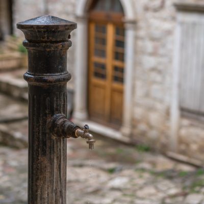 Old drinking water tap in the old town of Kotor,  Montenegro,Image: 409678662, License: Royalty-free, Restrictions: , Model Release: no