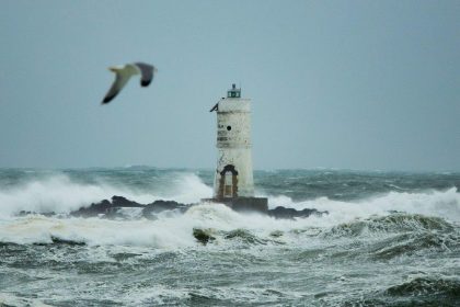 The lighthouse of the Mangiabarche shrouded by the waves of a mistral wind storm,Image: 516074192, License: Royalty-free, Restrictions: , Model Release: no